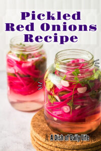 Main image for Pickled Red Onions Recipe. 2 jars of red onions ready to eat on the counter.