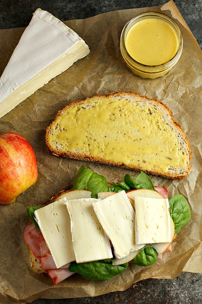 This Ham, Brie, Apple and Spinach Panini with Homemade Honey Mustard is a delicious combination of flavors for gourmet sandwich lovers everywhere! Plus it's a great way to use up leftover Easter ham!