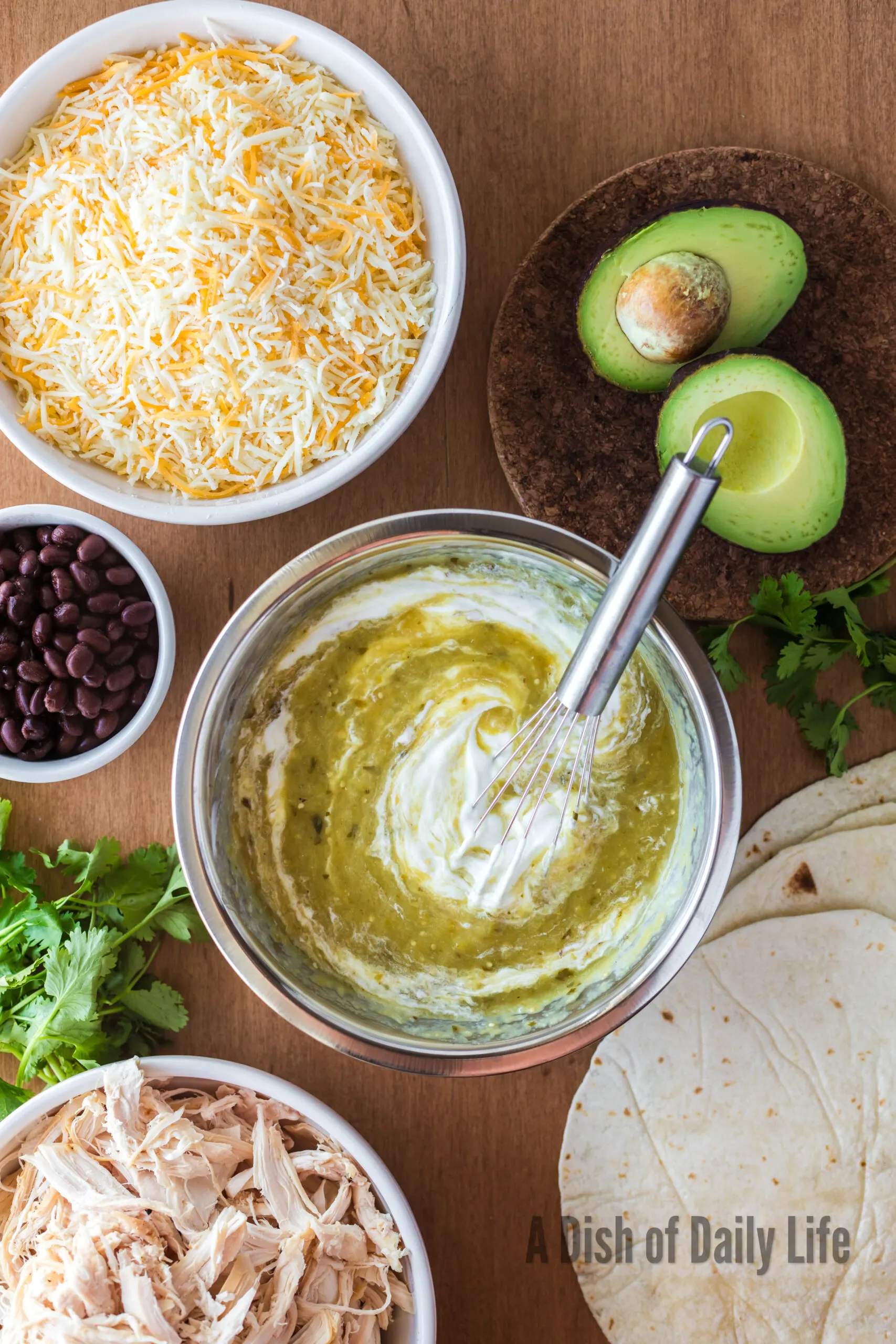 Green Chile Enchilada Sauce and Greek yogurt mixed together in a bowl