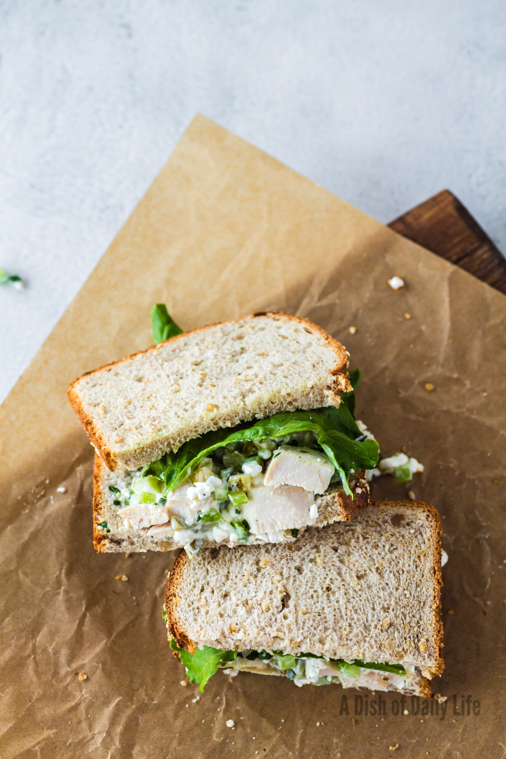 sandwich laid out on a piece of parchment paper