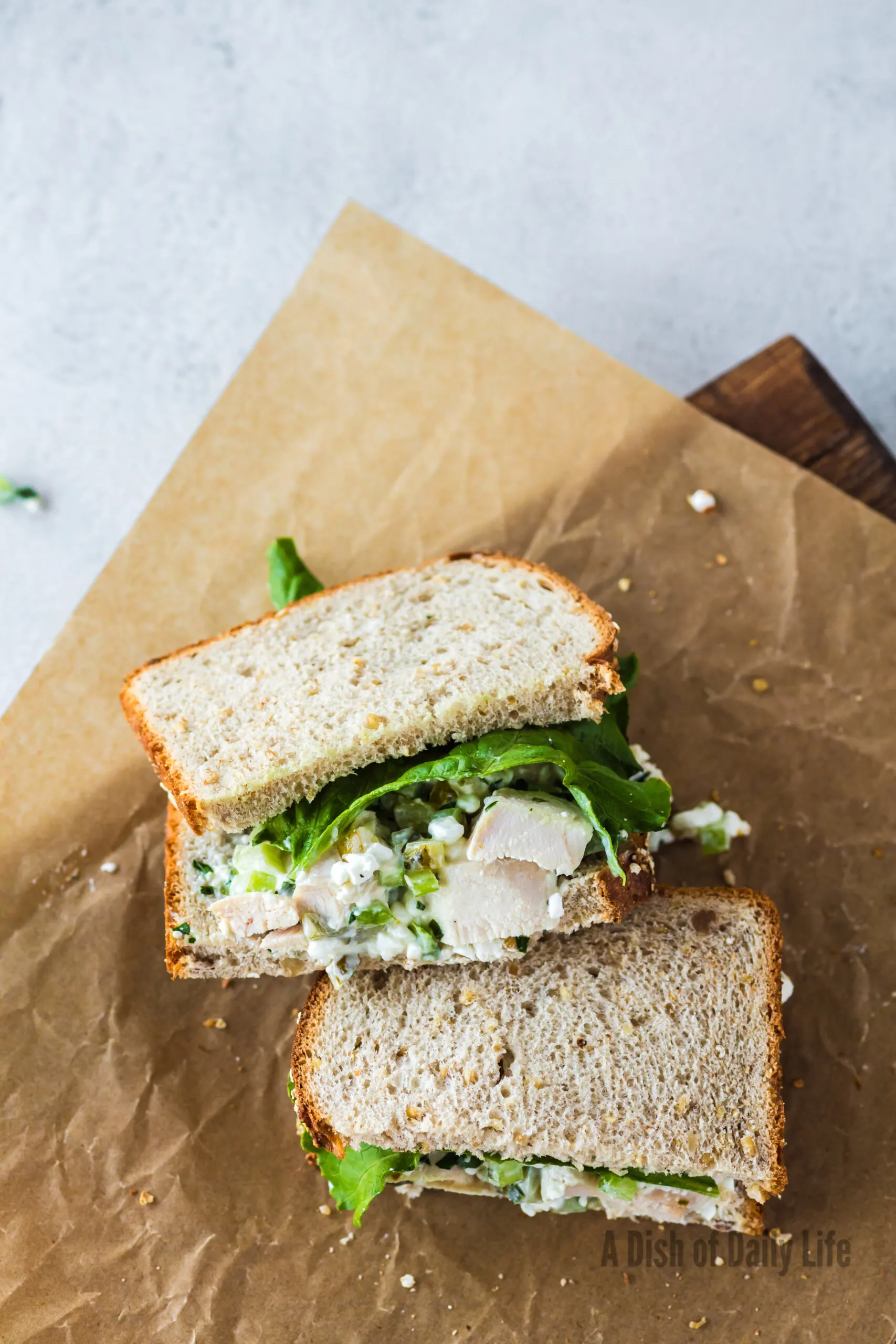 sandwich laid out on a piece of parchment paper