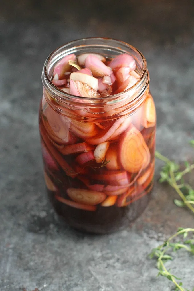 Pickled Shallots are quite versatile and can be used interchangeably anywhere pickled onions can be used...on carnitas or fish tacos, sandwiches or salads, or even Swedish meatballs! #condiment #pickles