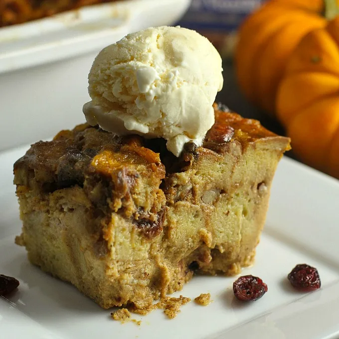 Pumpkin, Pecan and Cranberry Bread Pudding...this fun and festive dessert is the perfect finishing touch to this elegant dinner party menu for the holidays! Try it with a scoop of ice cream on top! #breadpudding #dessert