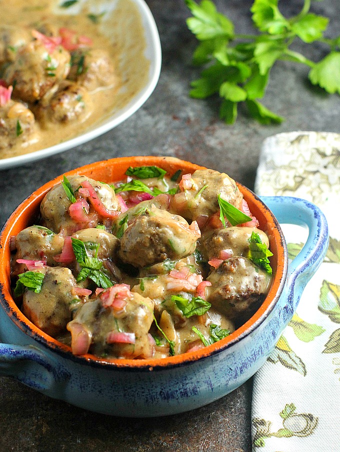 Swedish Meatballs, topped with pickled shallots, are the perfect starter to this elegant dinner party menu! #appetizer #SwedishMeatballs #meatballs