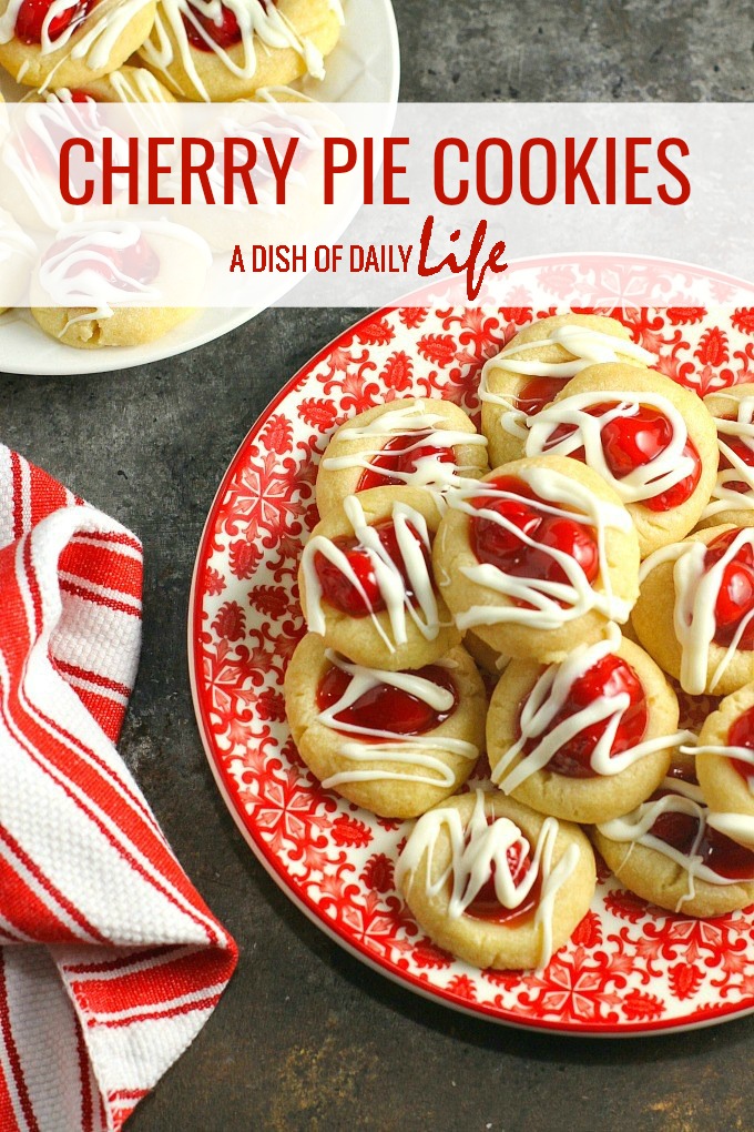 These pretty (and delicious!) shortbread style Cherry Pie cookies are perfect for holiday cookie exchanges or special occasions! Your guests will never guess how easy they are to make! #Christmas #cookies #cherrypie #cherries #cookieexchange #dessert #cookierecipe