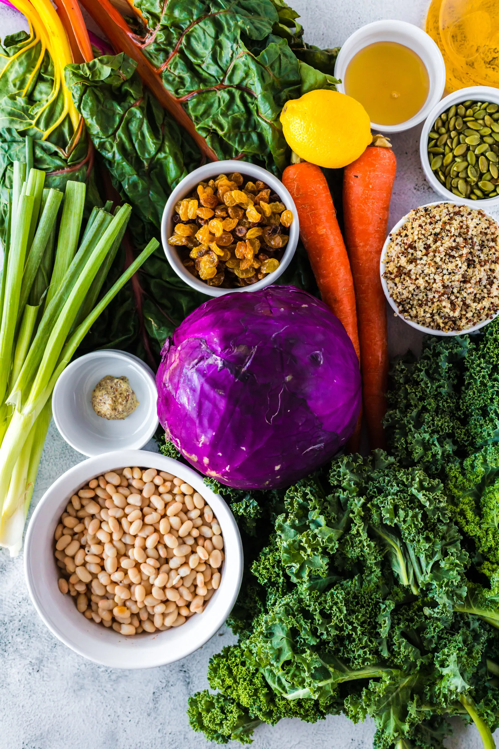 All ingredients for Power Greens Salad laid out on counter top