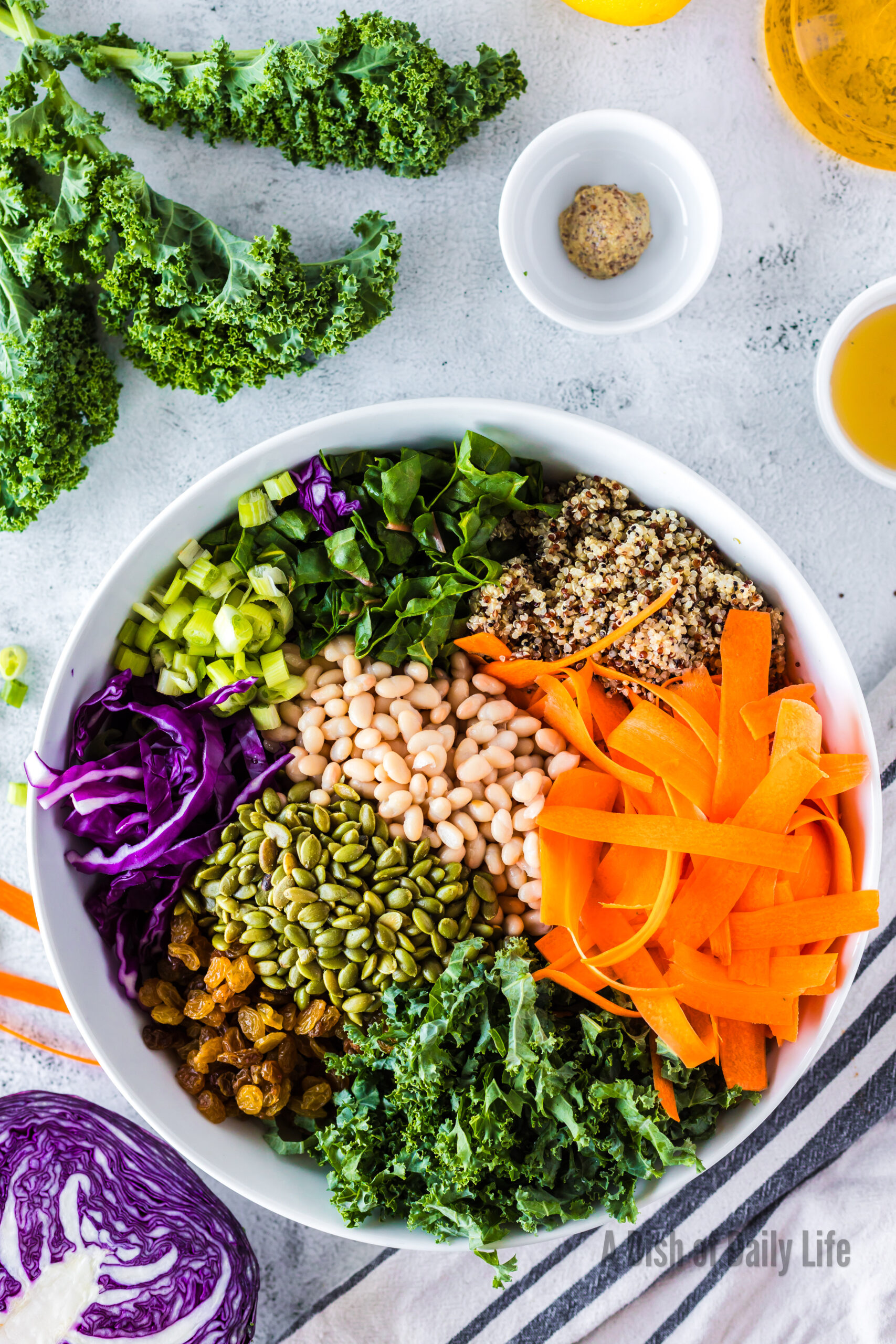 All salad ingredients in a bowl, unmixed