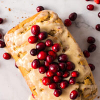 Bread baked, glazed and topped with fresh cranberries