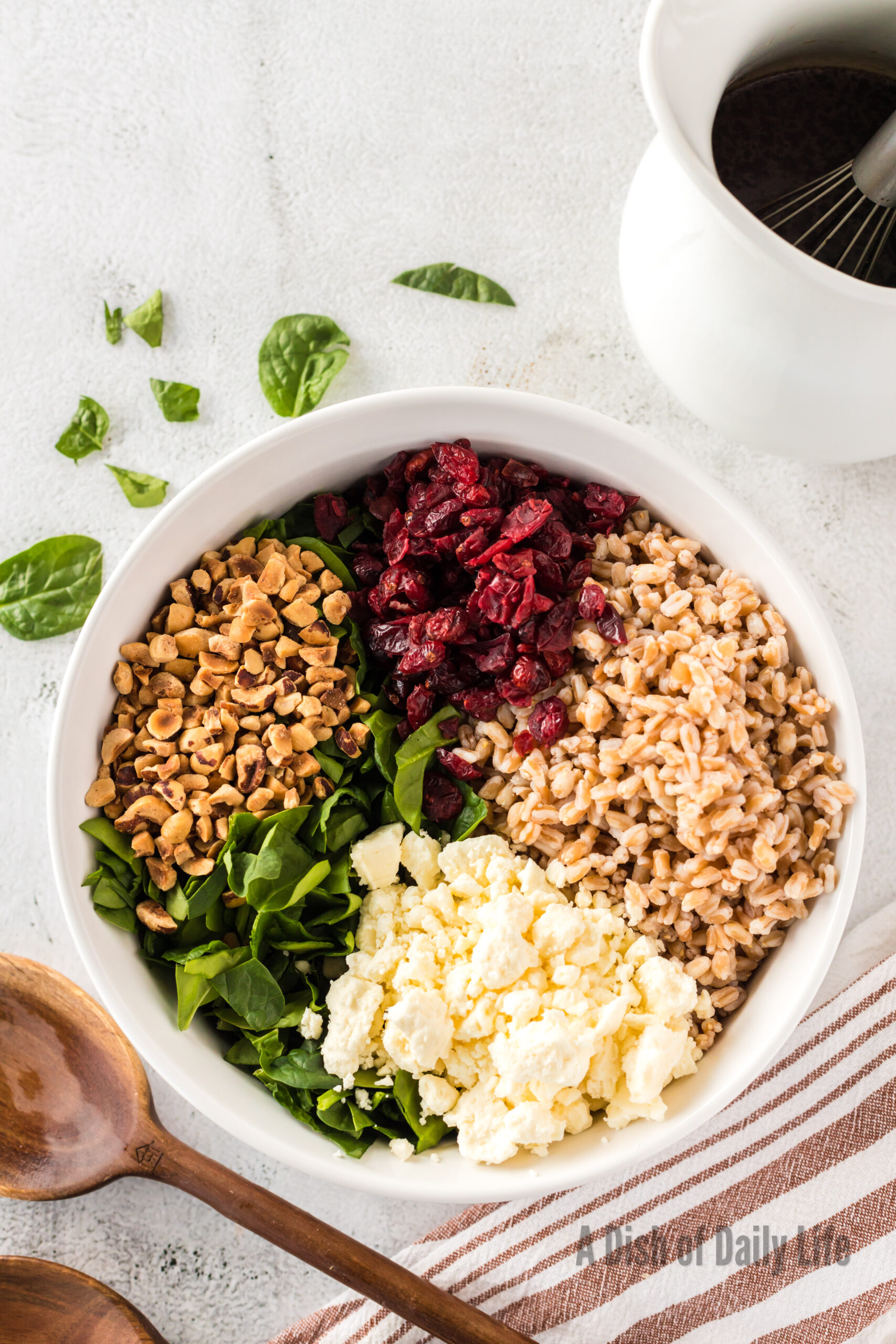 All ingredients minus the dressing in a bowl, ready to be tossed