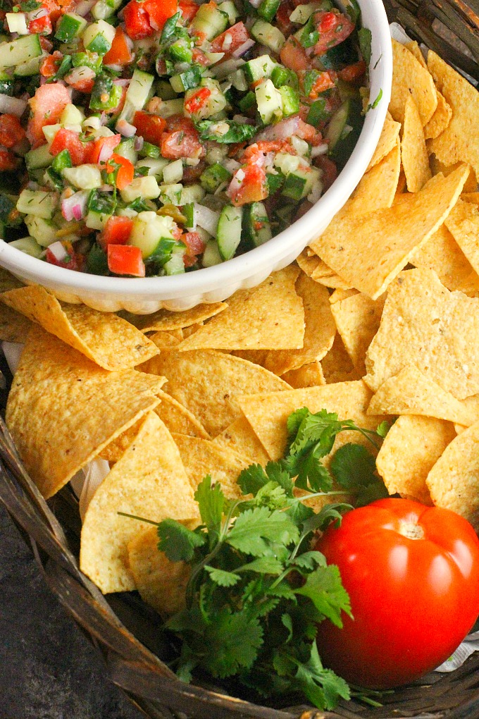 Cucumber Salsa....delicious with chips, easily doubles as a salad, and is great over grilled chicken or fish as well! 