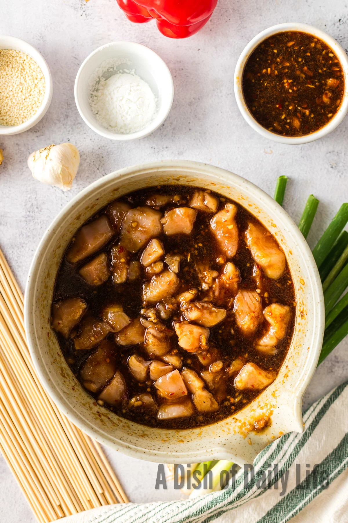 Marinade and chicken in a bowl to marrinate.