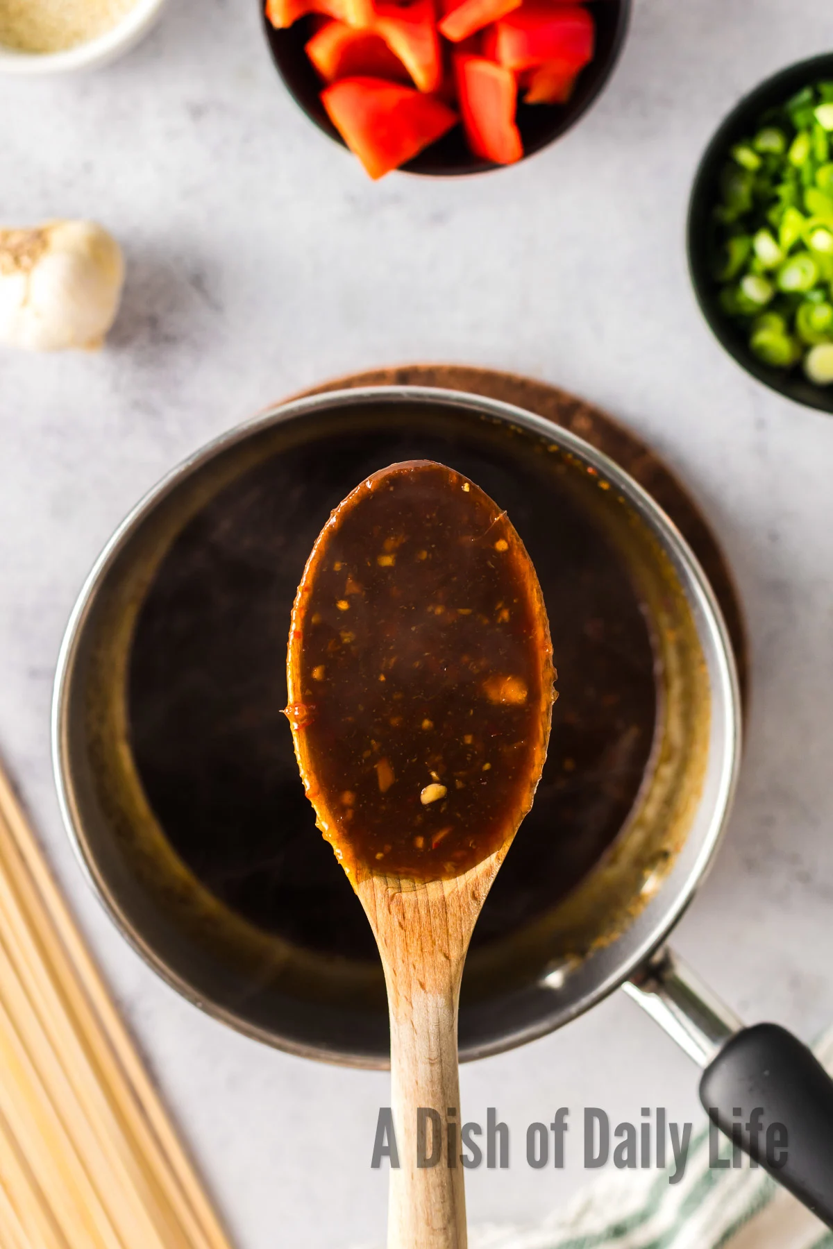 Remaining marinade in a pot cooked and thickened to make a sauce.