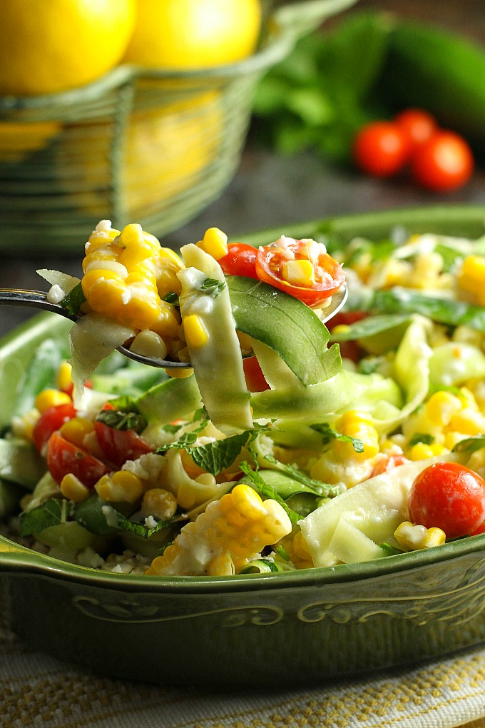 The tanginess of the Greek yogurt and the lemon makes for a wonderful flavor combination with this Zucchini Corn Salad..a taste of summer in every bite!