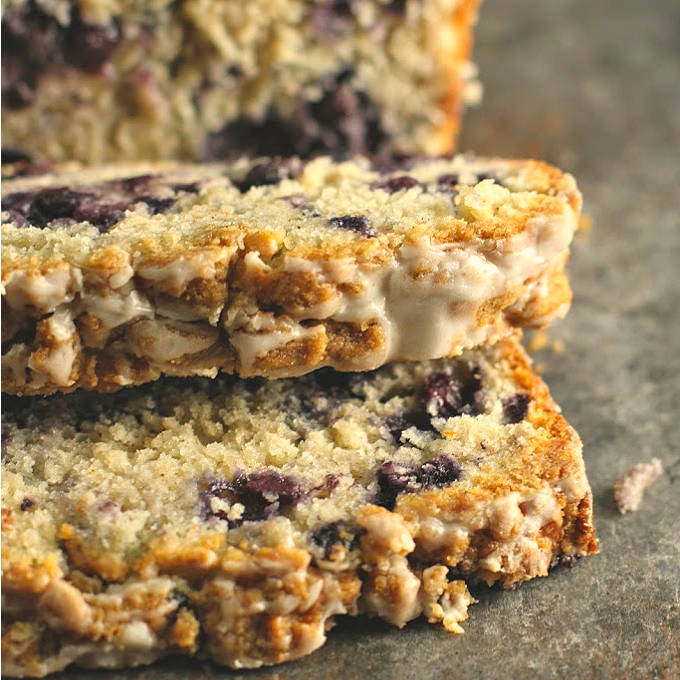 Blueberry Banana Streusel Eggnog Bread topped with vanilla eggnog glaze