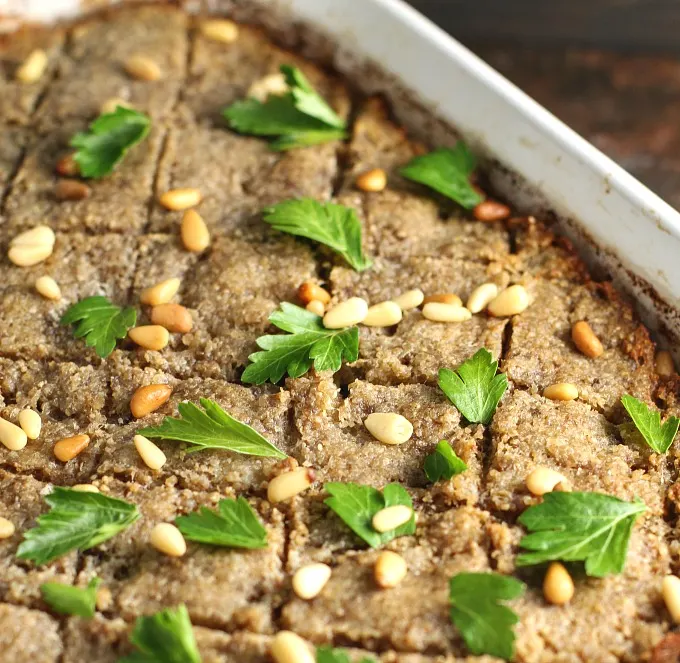 Baked Kibbeh with Yogurt Sauce...a Middle Eastern favorite! #Arabic #MiddleEastern #familyrecipes #lamb #appetizer #maindish #kibbe #kibbi