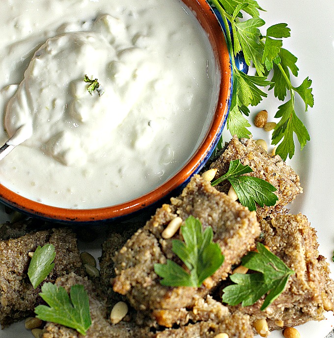 Baked Kibbeh with Yogurt Sauce...a Middle Eastern favorite! #Arabic #MiddleEastern #familyrecipes #lamb #appetizer #maindish #kibbe #kibbi