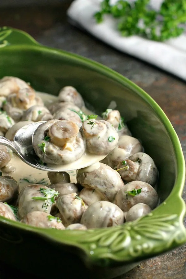 Creamy Marsala Mushrooms are the perfect appetizer for a holiday party, special occasion, or even a romantic dinner! The Creamy Marsala sauce is absolutely AMAZING! These mushrooms are versatile as well...you can also use them as a side dish, or slice them before cooking and use them as a topper for chicken or steak! #appetizer #sidedish #Christmas #NewYears #mushrooms