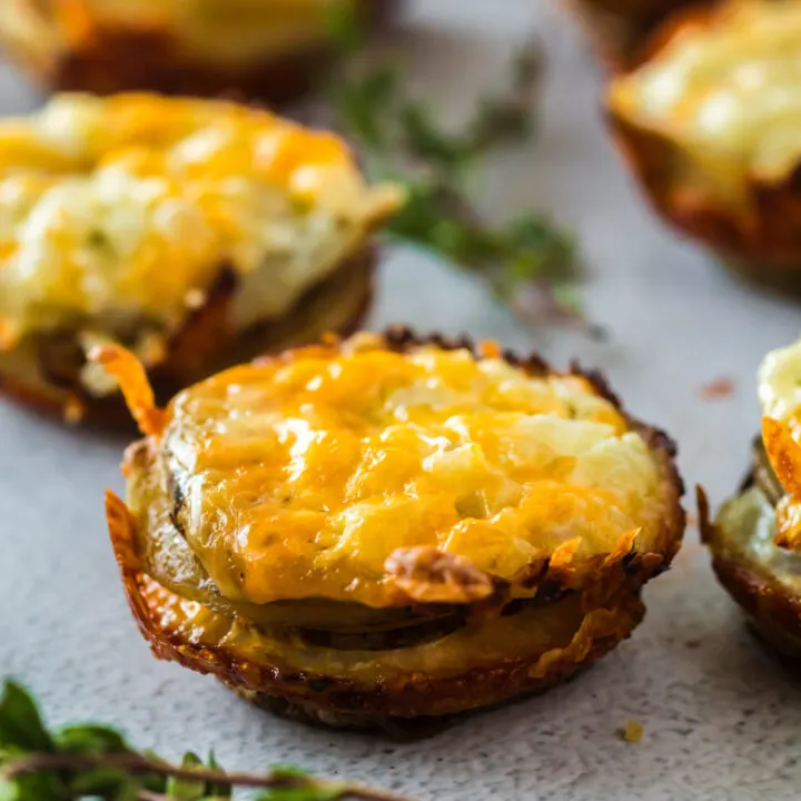 side view of multiple potato stacks on counter.