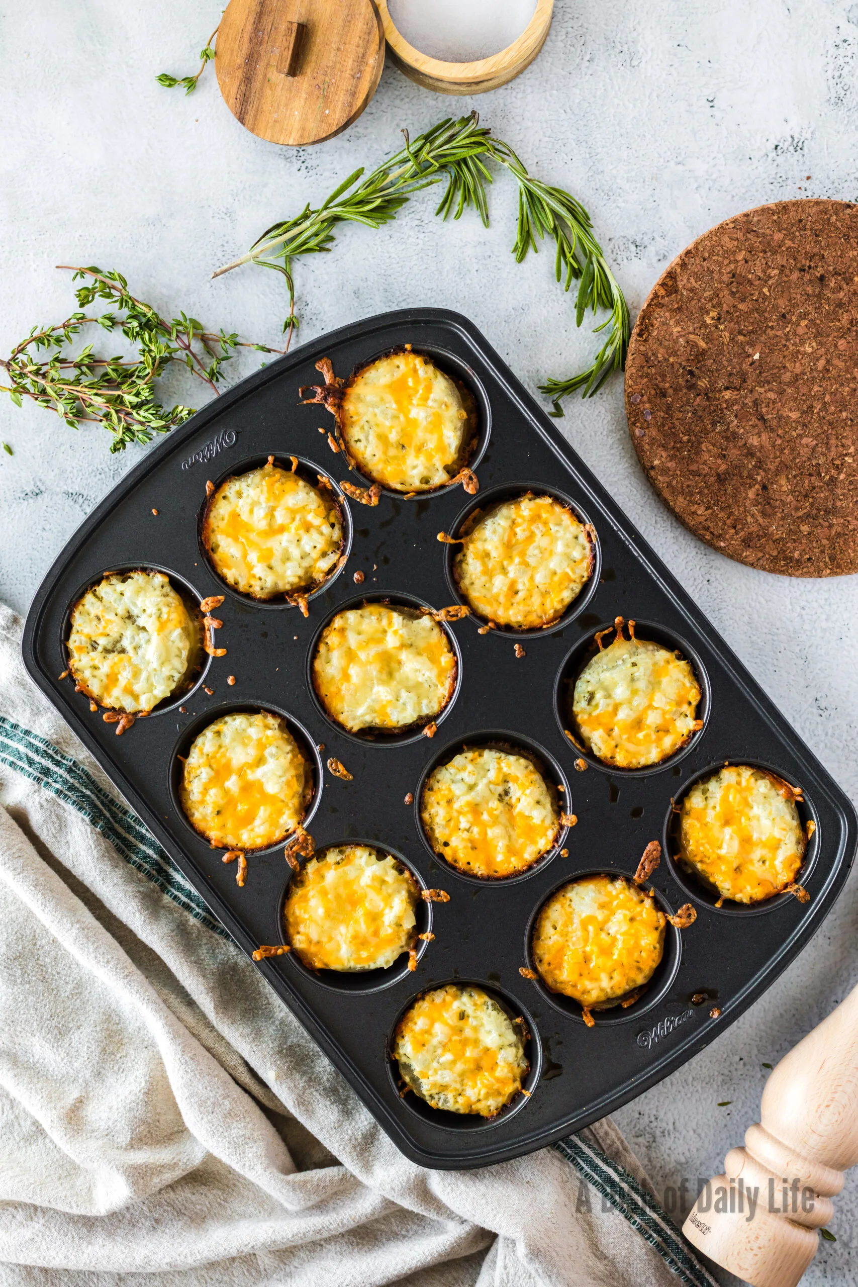Baked potato stacks in muffin tin.