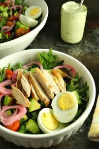 Swap out the sour cream for Greek yogurt in this "lightened" up version of Green Goddess Dressing! This delicious classic salad dressing doubles as a vegetable dip, and takes only minutes to make! #saladdressing #greengoddess #appetizer #vegetabledip