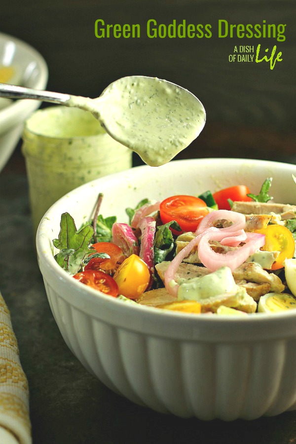 Swap out the sour cream for Greek yogurt in this "lightened" up version of Green Goddess Dressing! This delicious classic salad dressing doubles as a vegetable dip, and takes only minutes to make! #saladdressing #greengoddess #appetizer #vegetabledip