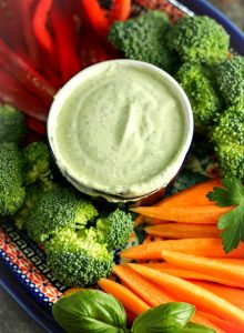 Swap out the sour cream for Greek yogurt in this "lightened" up version of Green Goddess Dressing! This delicious classic salad dressing doubles as a vegetable dip, and takes only minutes to make! #saladdressing #greengoddess #appetizer #vegetabledip