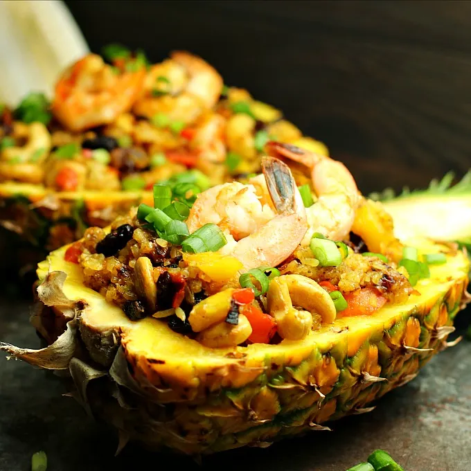 Pineapple Fried Rice is a fancy fried rice with pineapple, cashews, raisins, and a hint of curry. Skip the shrimp if you'd like and make it vegetarian. Serve it in a hollowed out pineapple to impress your guests!