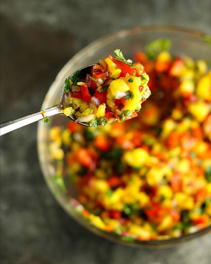 Take yourself back to the tropics at your next BBQ with this easy sweet and spicy Pineapple Salsa! Served with tortilla chips, it's perfect for potlucks, picnics or BBQs, but it's also great as a topper for chicken or fish!