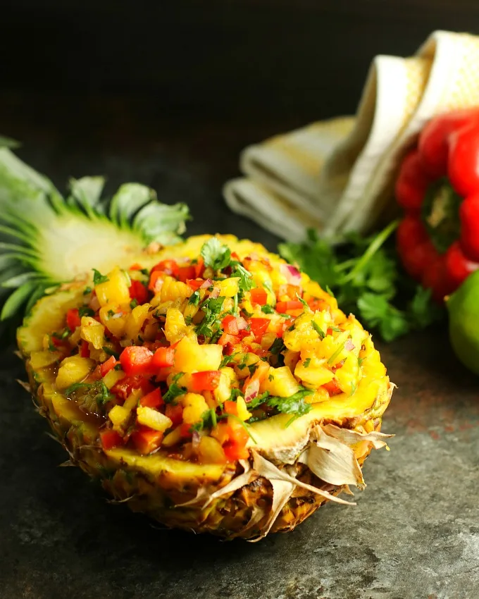 Take yourself back to the tropics at your next BBQ with this easy sweet and spicy Pineapple Salsa! Served with tortilla chips, it's perfect for potlucks, picnics or BBQs, but it's also great as a topper for chicken or fish!