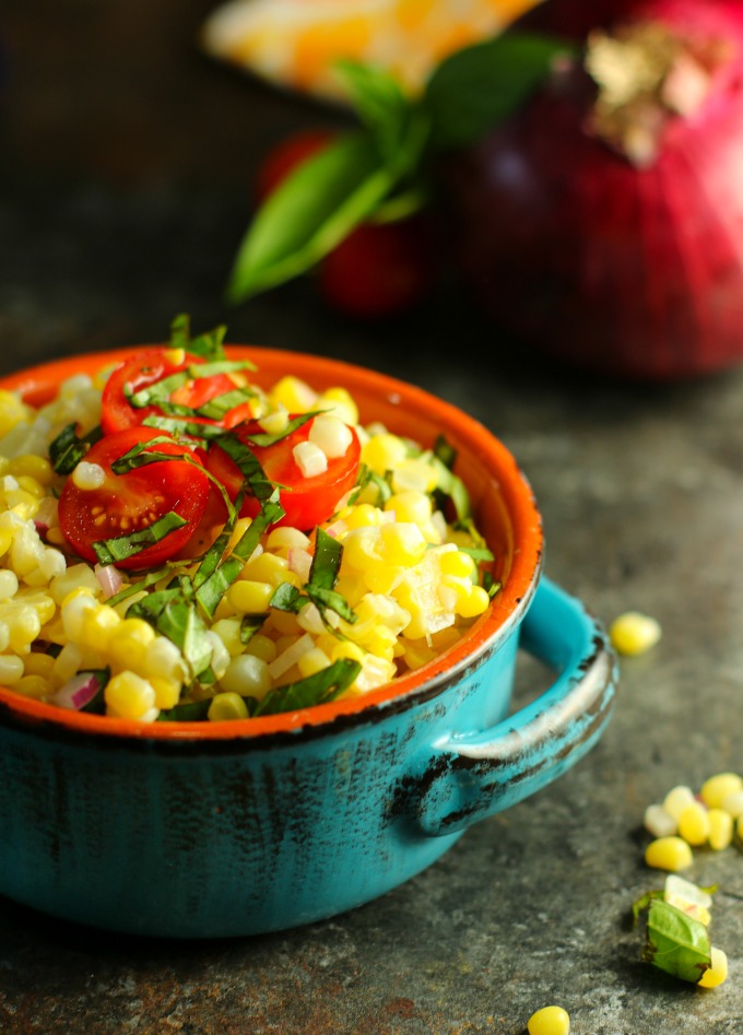 Summer Corn Salad is a flavor explosion of deliciousness! Easy to make with only a few ingredients, it's the perfect summer dish for potlucks, picnics and BBQs.