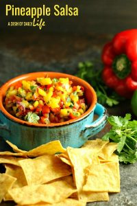 Take yourself back to the tropics at your next BBQ with this easy sweet and spicy Pineapple Salsa! Served with tortilla chips, it's perfect for potlucks, picnics or BBQs, but it's also great as a topper for chicken or fish!