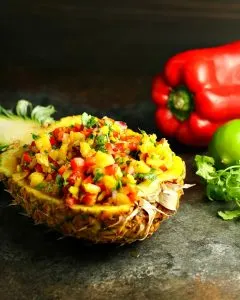 Pineapple Salsa served in a hollowed out pineapple