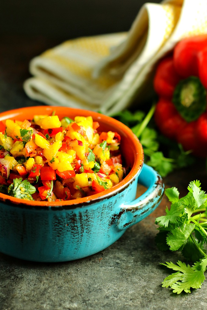 Take yourself back to the tropics at your next BBQ with this easy sweet and spicy Pineapple Salsa! Served with tortilla chips, it's perfect for potlucks, picnics or BBQs, but it's also great as a topper for chicken or fish!