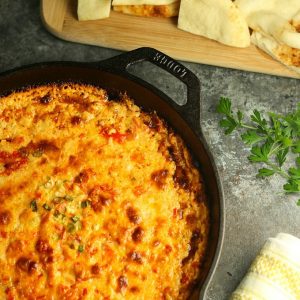 Hot Peppadew Cheese Dip, with its delicious mixture of savory cheeses and the sweet tang of Peppadew peppers, is an easy crowd-pleasing appetizer!