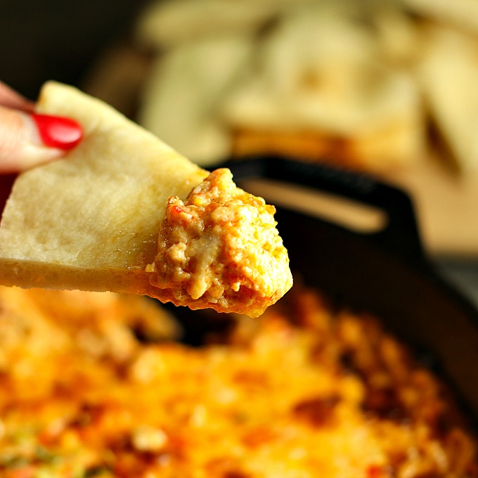 Hot Peppadew Cheese Dip is an easy crowd-pleasing appetizer! The mixture of savory cheeses along with the sweet heat of Peppadew peppers and a few other condiments and spices is the perfection combination…one bite and you will be hooked! #appetizer #tailgate #gameday #cheesedip #Peppadews #PeppadewPeppers #dip