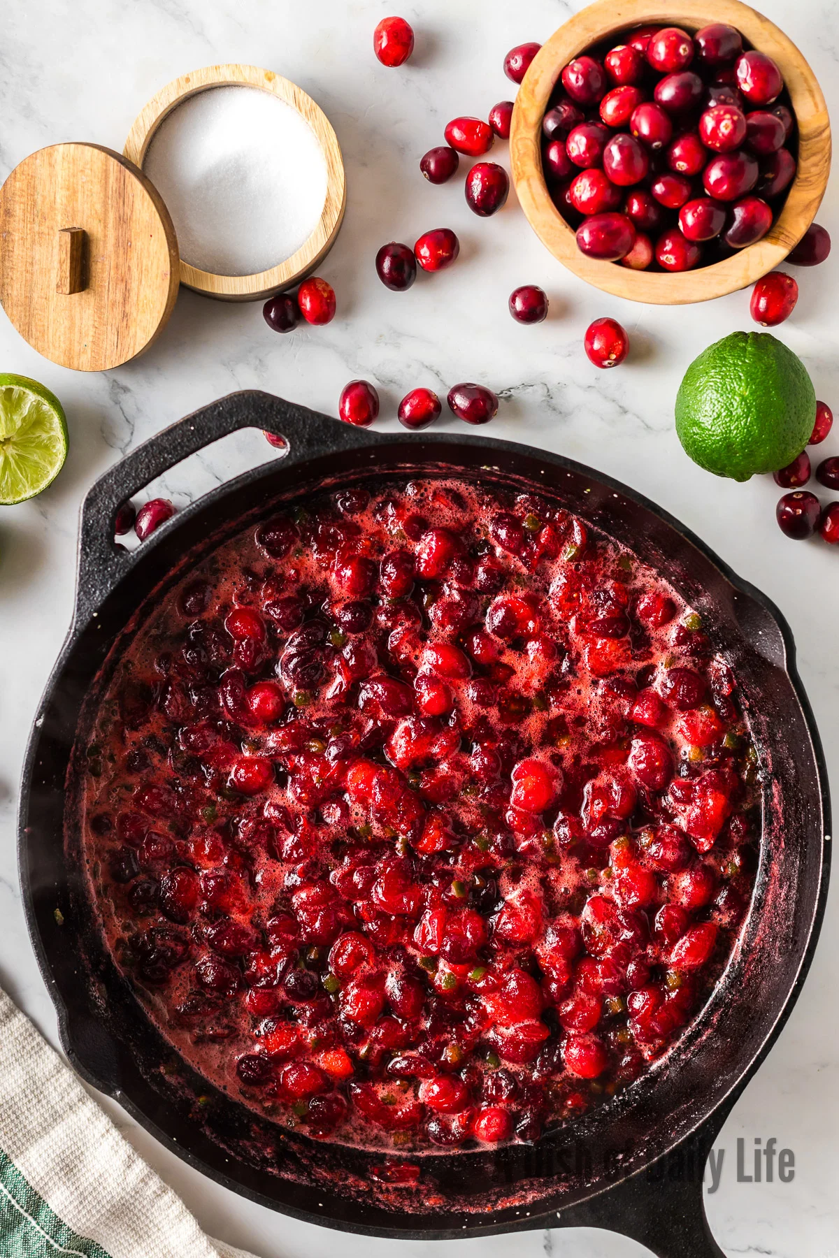 cooked and burst cranberries in skillet