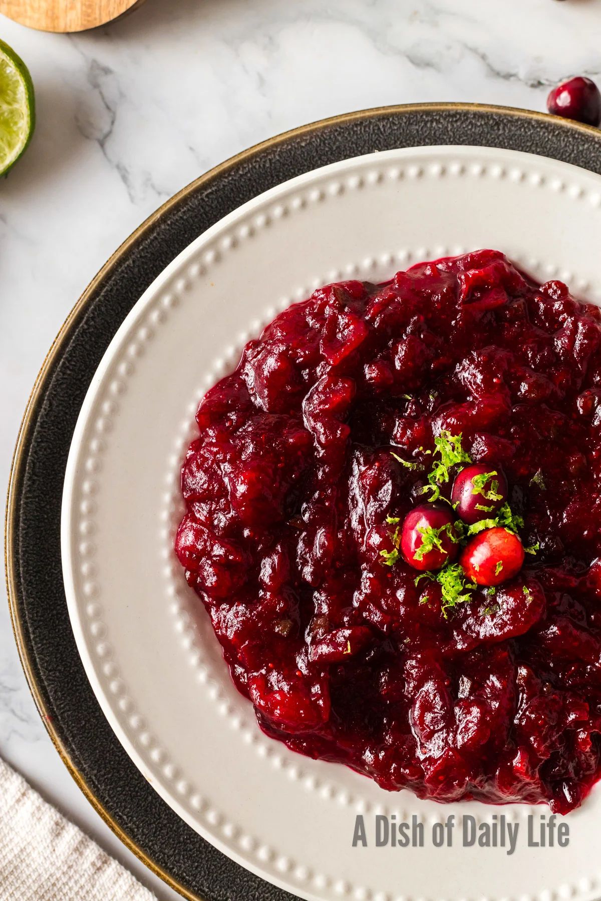 top view looking down at cranberry sauce in a serving bowl.