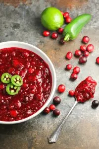 Jalape&ntilde;os and lime give this Spicy Jalape&ntilde;o Cranberry Sauce a unique flavor all its own. You're going to love the combination of the sweet, tart and spicy! #cranberrysauce #Thanksgiving #Christmas #appetizer #sidedish #holidayrecipe