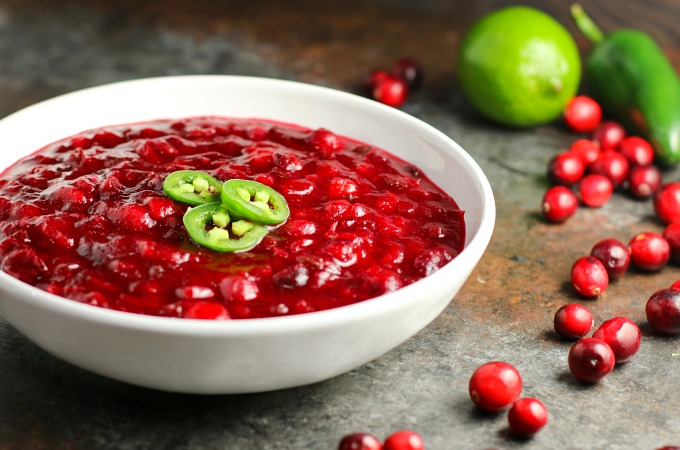 Jalapeños and lime give this Spicy Jalapeño Cranberry Sauce a unique flavor all its own. You're going to love the combination of the sweet, tart and spicy! #cranberrysauce #Thanksgiving #Christmas #appetizer #sidedish #holidayrecipe