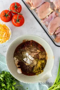 sour cream, cornstarch, oregano, garlic powder,cumin, chili powder, fire roasted tomatoes, chopped green chilies and salt and pepper.