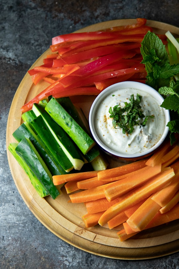 Greek Yogurt Tahini Sauce with a tray of vegetables