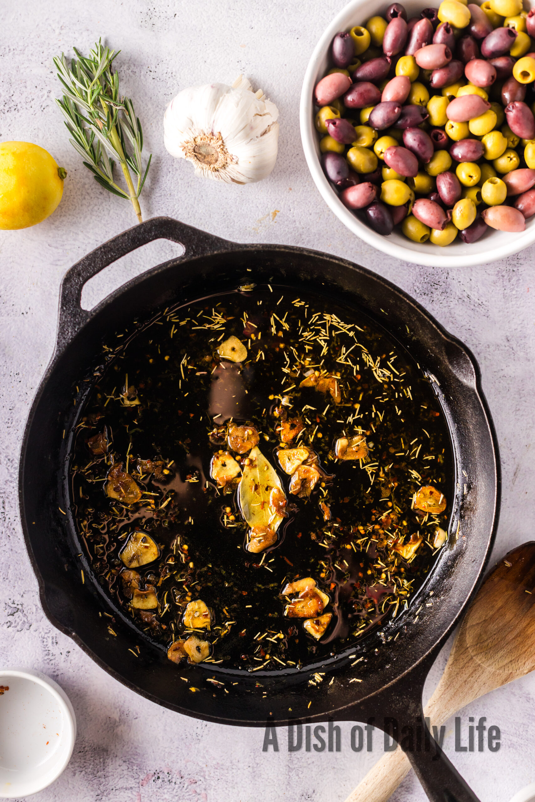 garlic and herb mixture cooked in skillet