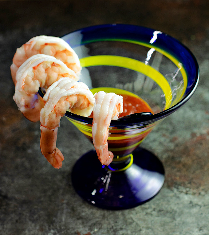 Individual serving of shrimp cocktail with a homemade cocktail sauce