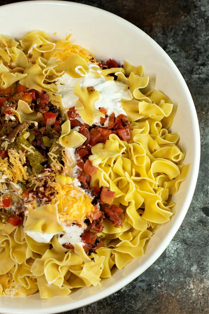 Mexican taco noodle casserole ingredients, ready to be mixed