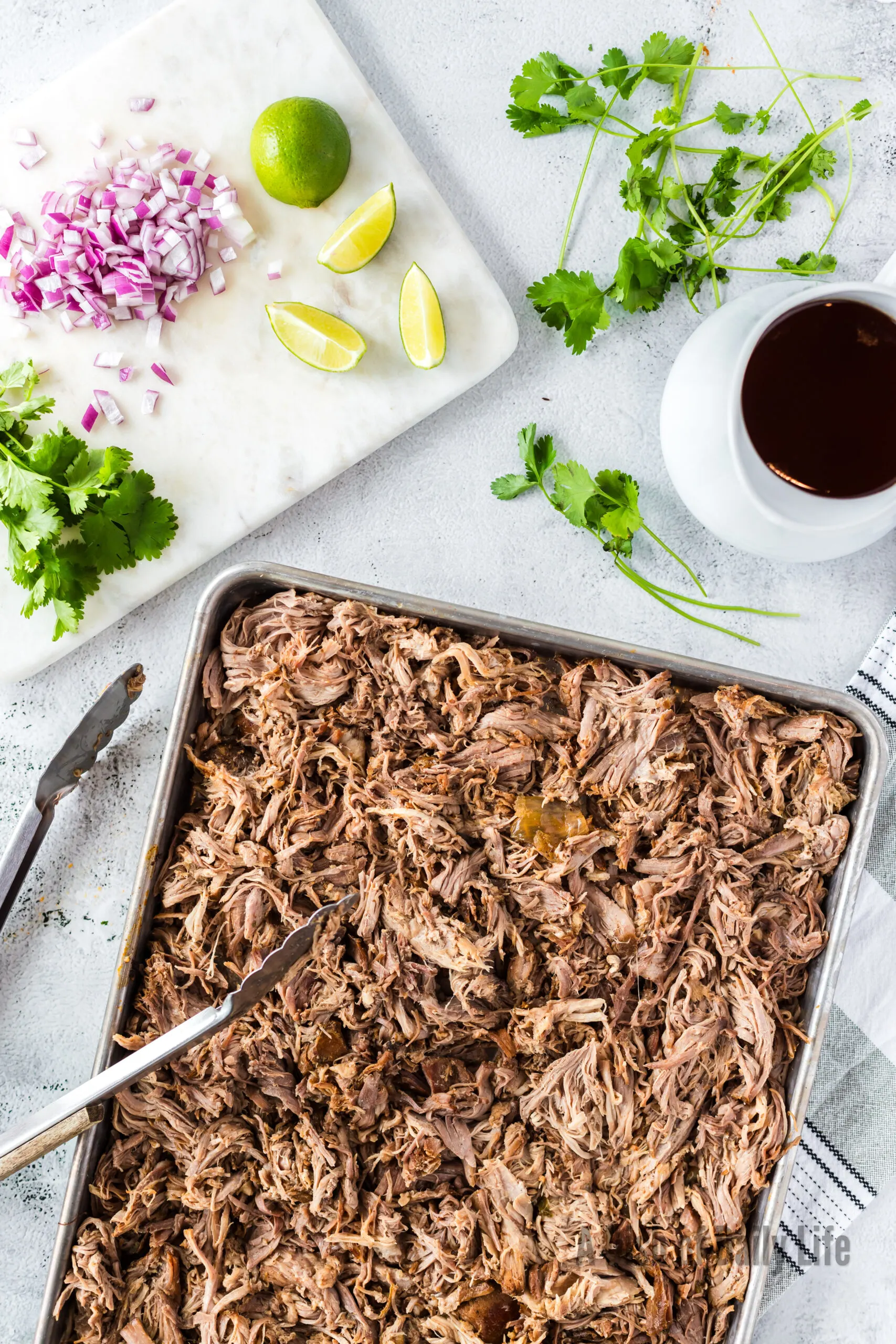 shredded pork butt on cookie sheet