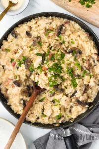 salt, pepper and chopped parsley added to risotto.