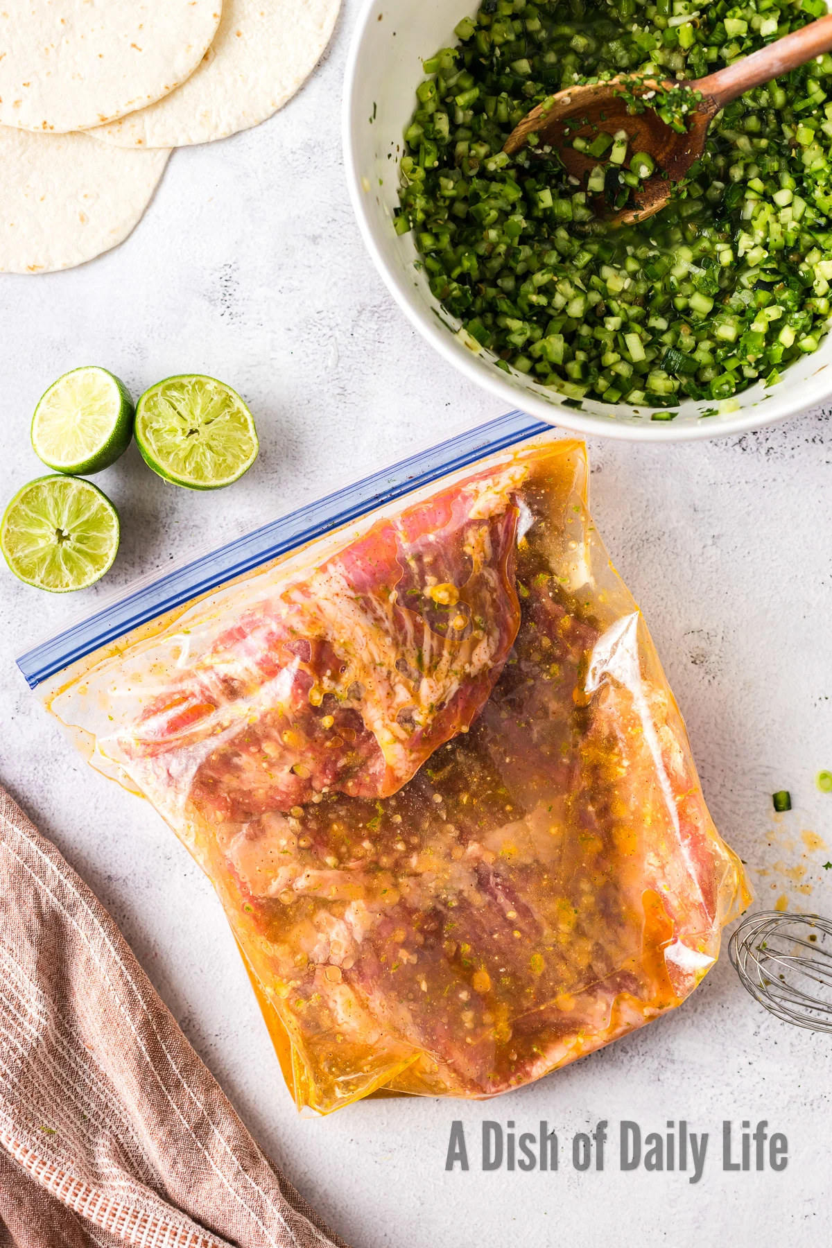 flank steak in a zipper bag with marinade