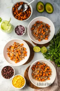 Roasted Sweet Potatoes topping farro in bowls