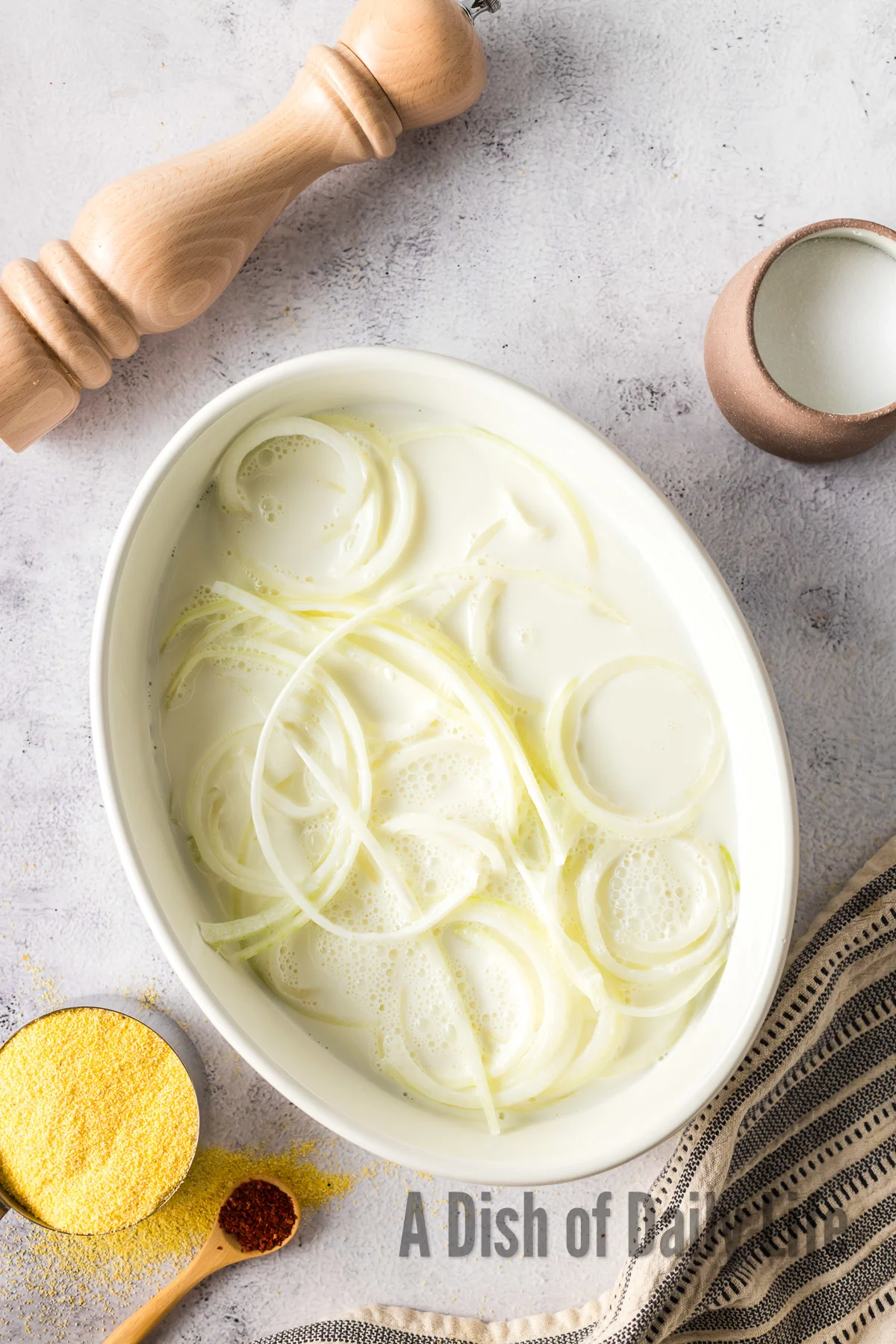 Onions soaking in buttermilk