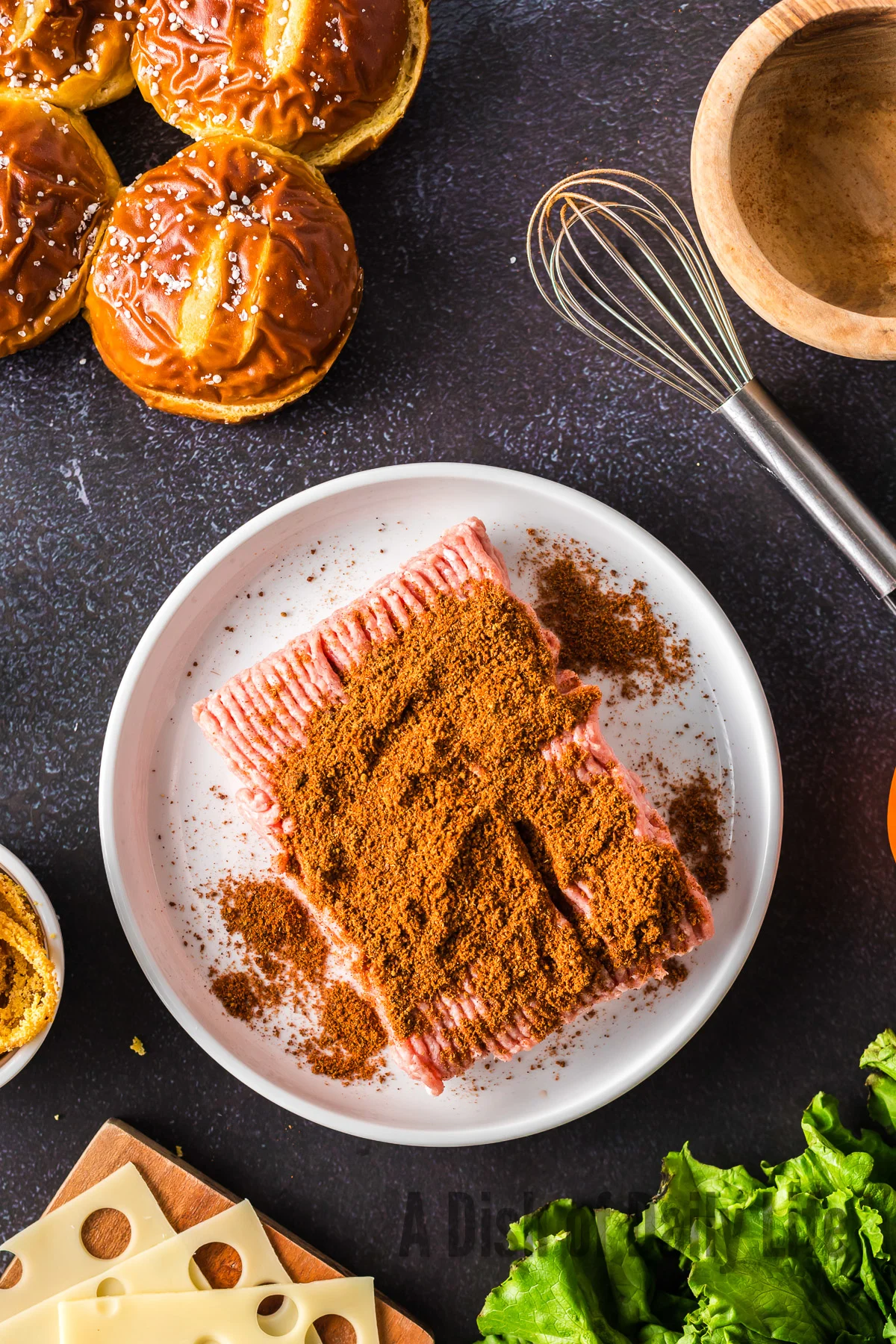 seasoning sprinkled on top of meat